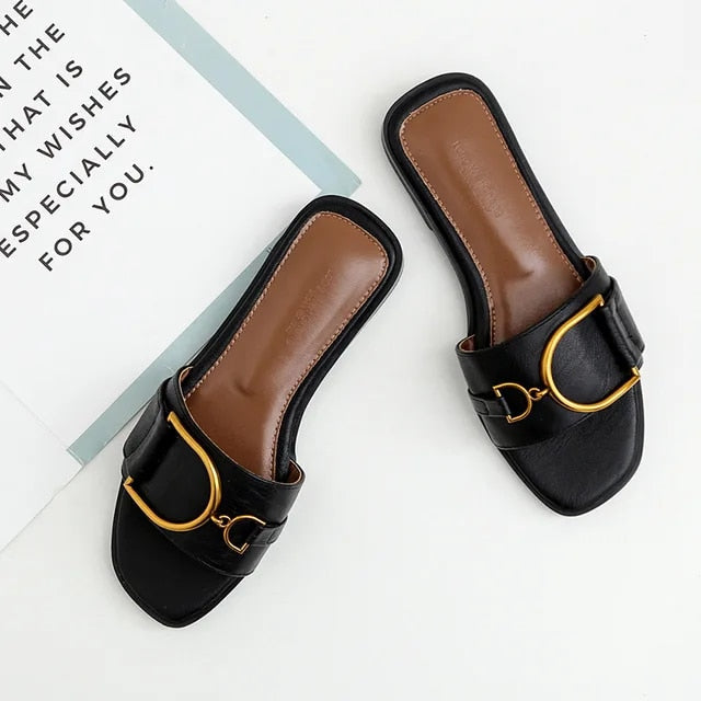 TS | Elegant slip-on sandals with statement buckle